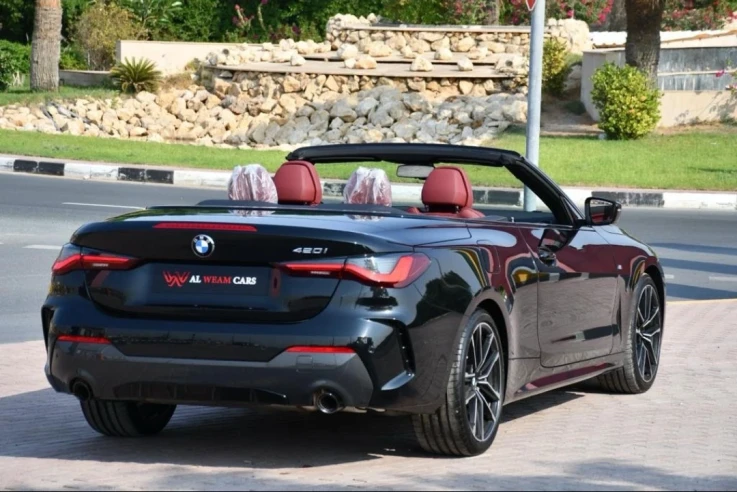 BMW 420 I Convertible 2024 BLACK RENTAL IN DUBAI - undefined